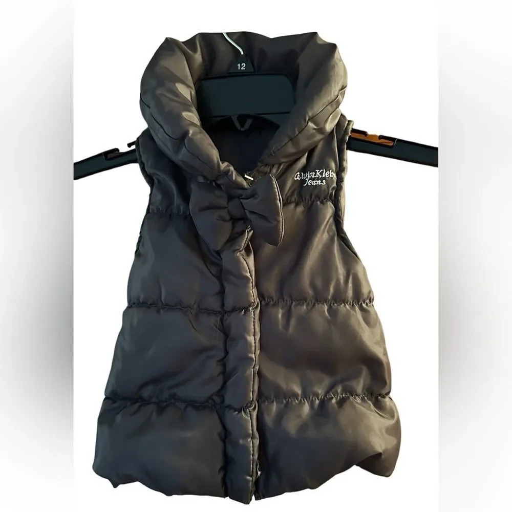 Calvin Klein little boy bow-tie pufferโvest. Soโcute!